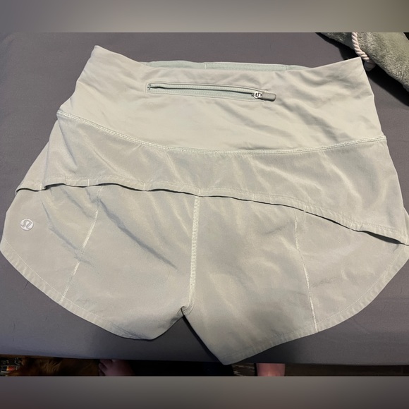 Light green size 4 Lululemon shorts, just don’t grab for them anymore - Picture 2 of 3